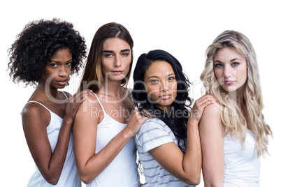 Multiethnic women standing in a line