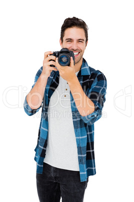 Young man using camera