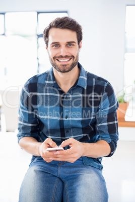 Portrait of happy man using mobile phone Portrait of happy man using mobile phone