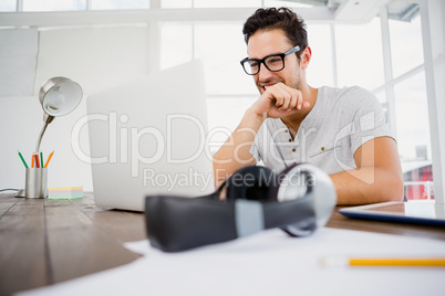 Young man working at his desk