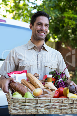 Delivery man carrying package