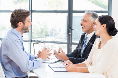 Business colleagues discussing during meeting