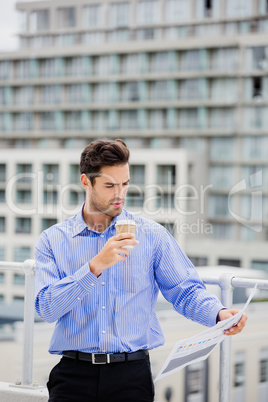 Businessman reading a newspaper