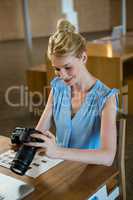 Woman checking photo in camera