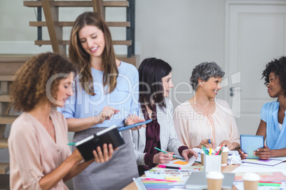 Group of interior designers interacting with each other