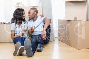 Young couple holding glasses of champagne