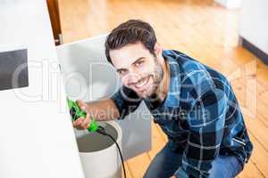 Man fixing kitchen sink