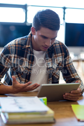 Young man using digital tablet