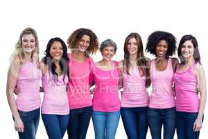 Happy multiethnic women standing together with arm around