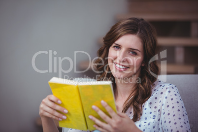 Beautiful woman reading a book