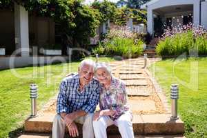 Senior couple embracing in the garden