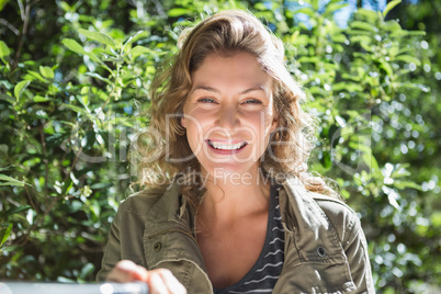 Smiling woman taking selfies