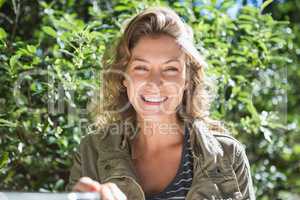 Smiling woman taking selfies