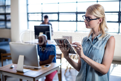 Young woman using digital tablet