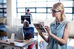 Young woman using digital tablet