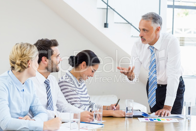 Business colleagues discussing in a meeting