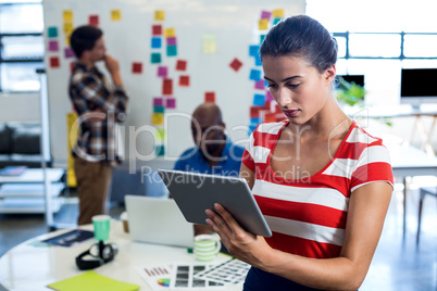 Young woman using digital tablet