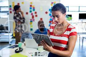 Young woman using digital tablet