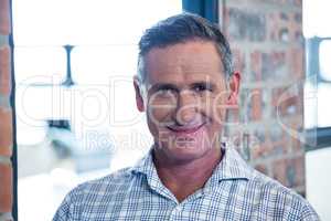 Portrait of man smiling at camera