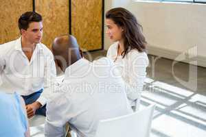 Colleagues comforting a unhappy woman