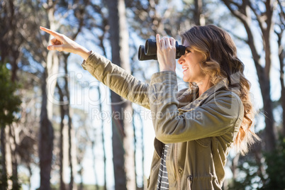 Woman using binoculars