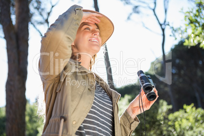 Woman using binoculars