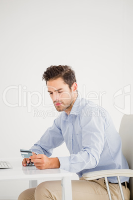 Businessman doing online shopping on computer