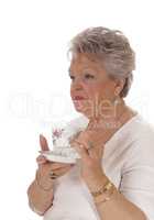 Senior woman drinking coffee.