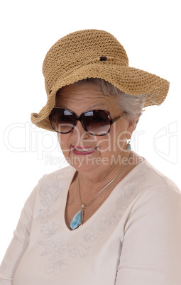 Senior woman with straw hat.