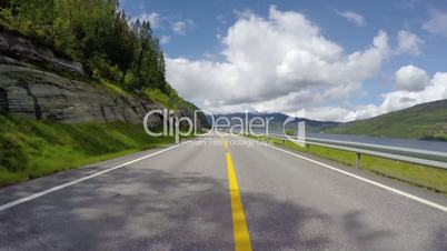 Driving a Car on a Road in Norway