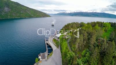 Ferries' cross. Aerial footage Beautiful Nature Norway. Flying over the lakes and fjords.View from the bird's-eye view.