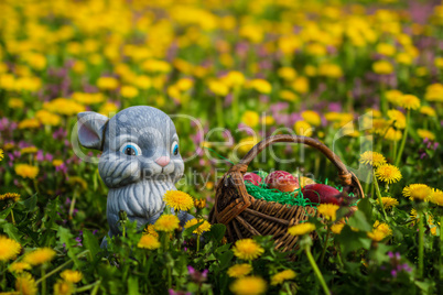 Easter eggs in basket and rabbit