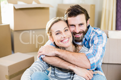 Portrait of couple embracing each other