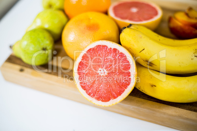 Close-up of fruits on chopping board