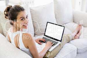 Young woman using laptop