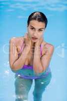 Beautiful woman in swimming pool