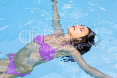 Beautiful woman in swimming pool