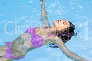 Beautiful woman in swimming pool