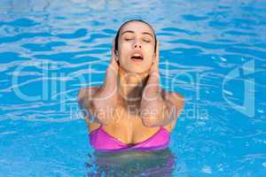 Beautiful woman in swimming pool