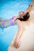 Beautiful woman in swimming pool