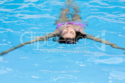 Beautiful woman in swimming pool