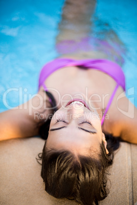 Beautiful woman in swimming pool