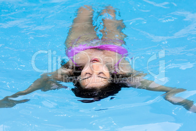 Beautiful woman in swimming pool