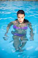 Beautiful woman in swimming pool