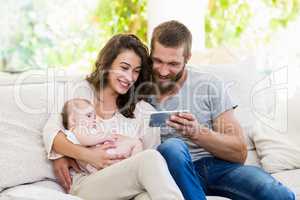 Family using mobile phone