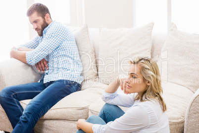 Young couple ignoring each other