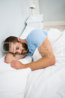 Man sleeping on bed