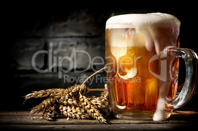 Beer near brick wall