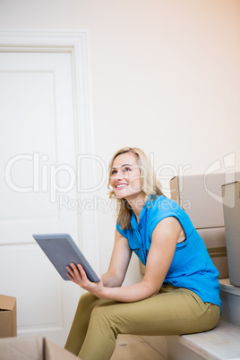 Young woman using digital tablet