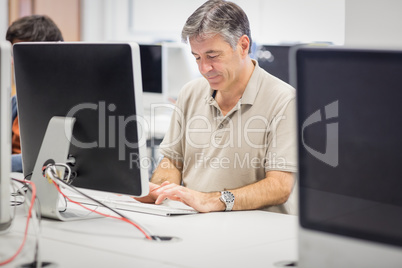 Professor working on computer